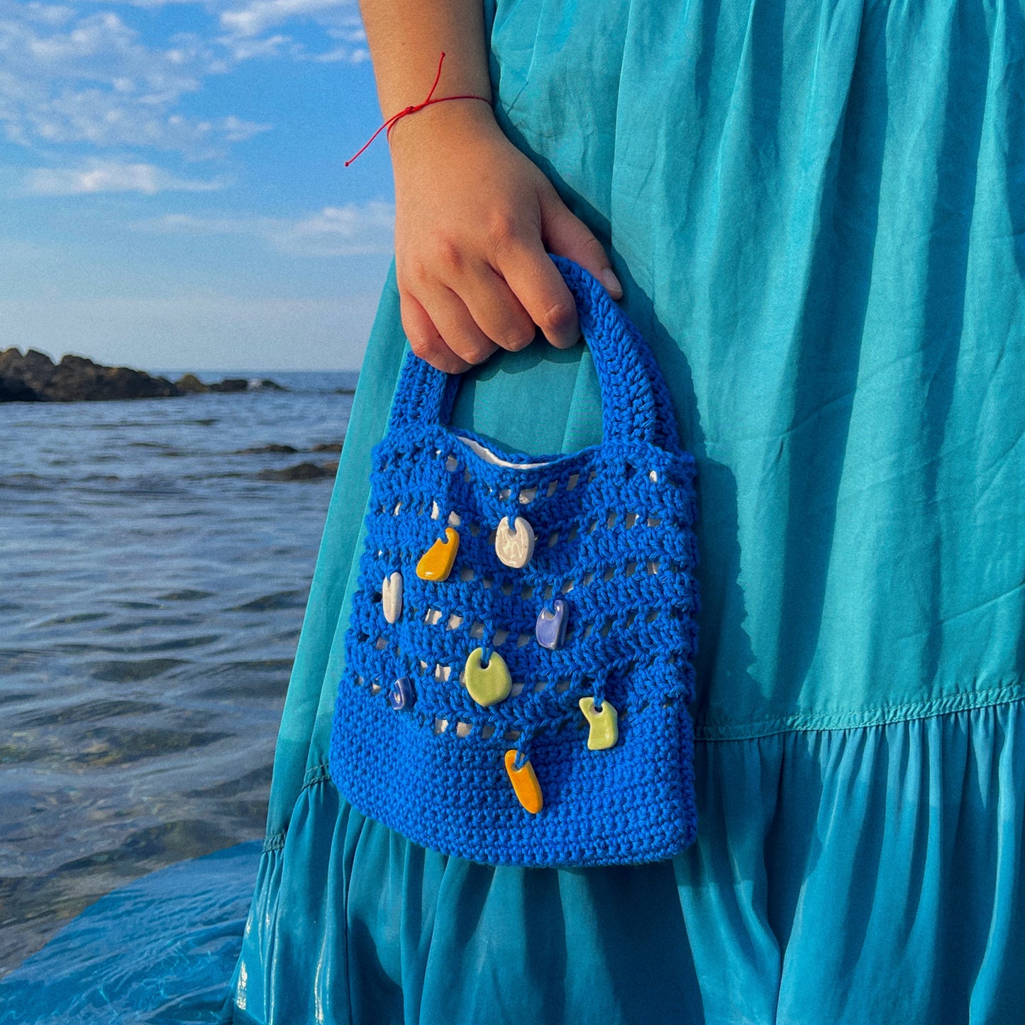 Agua del mar - Sac à coquillages