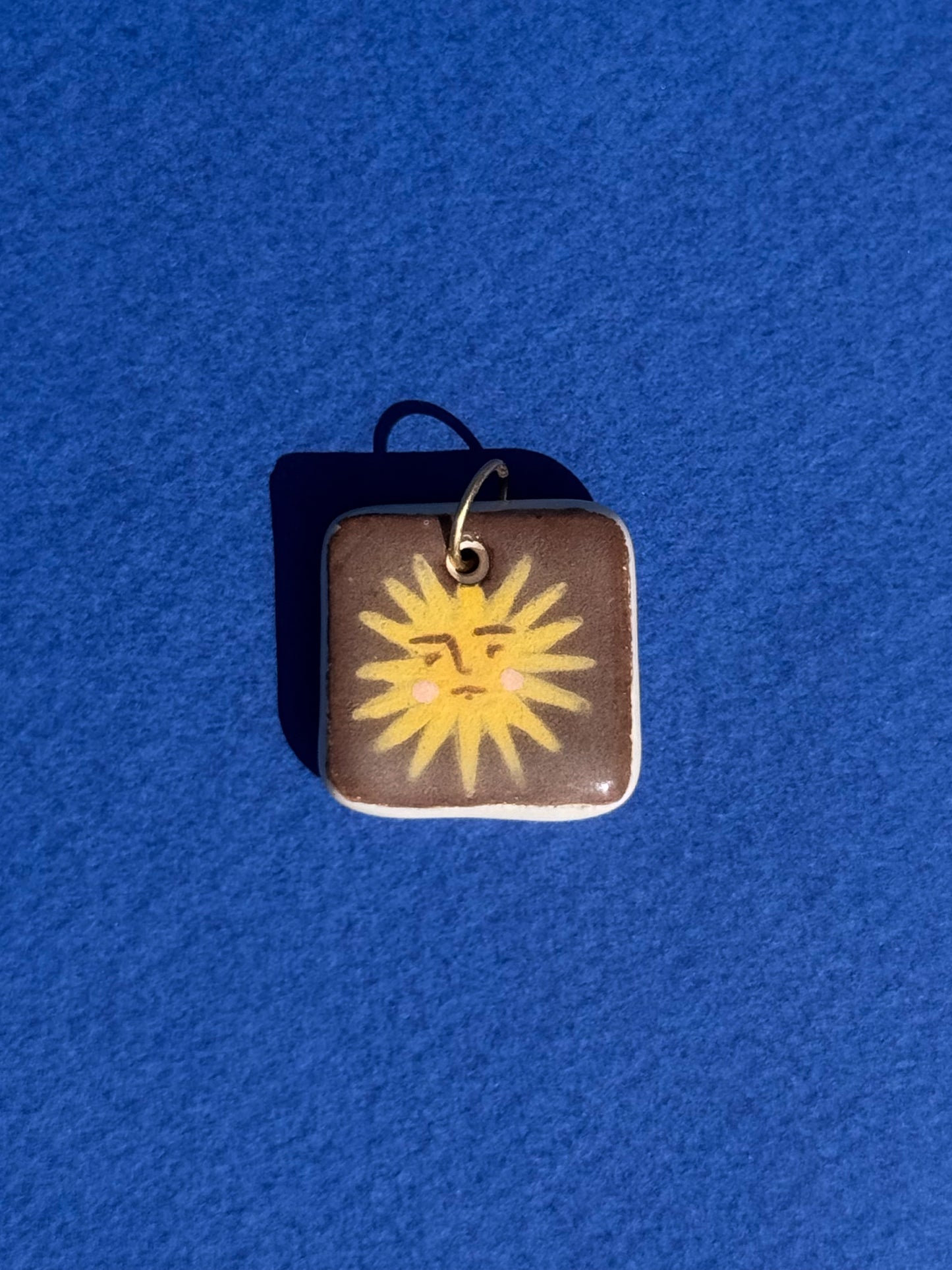 Le soleil - Médaillon + Carte postale