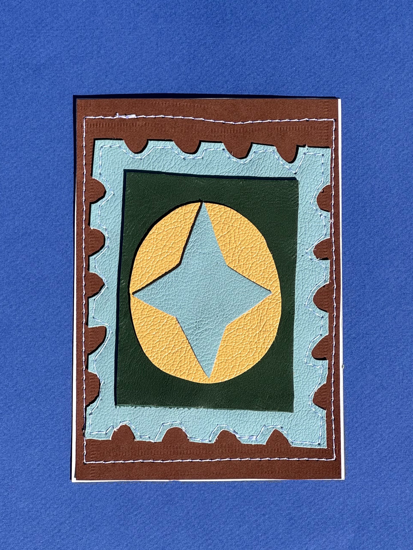 L'étoile - Médaillon + Carte postale