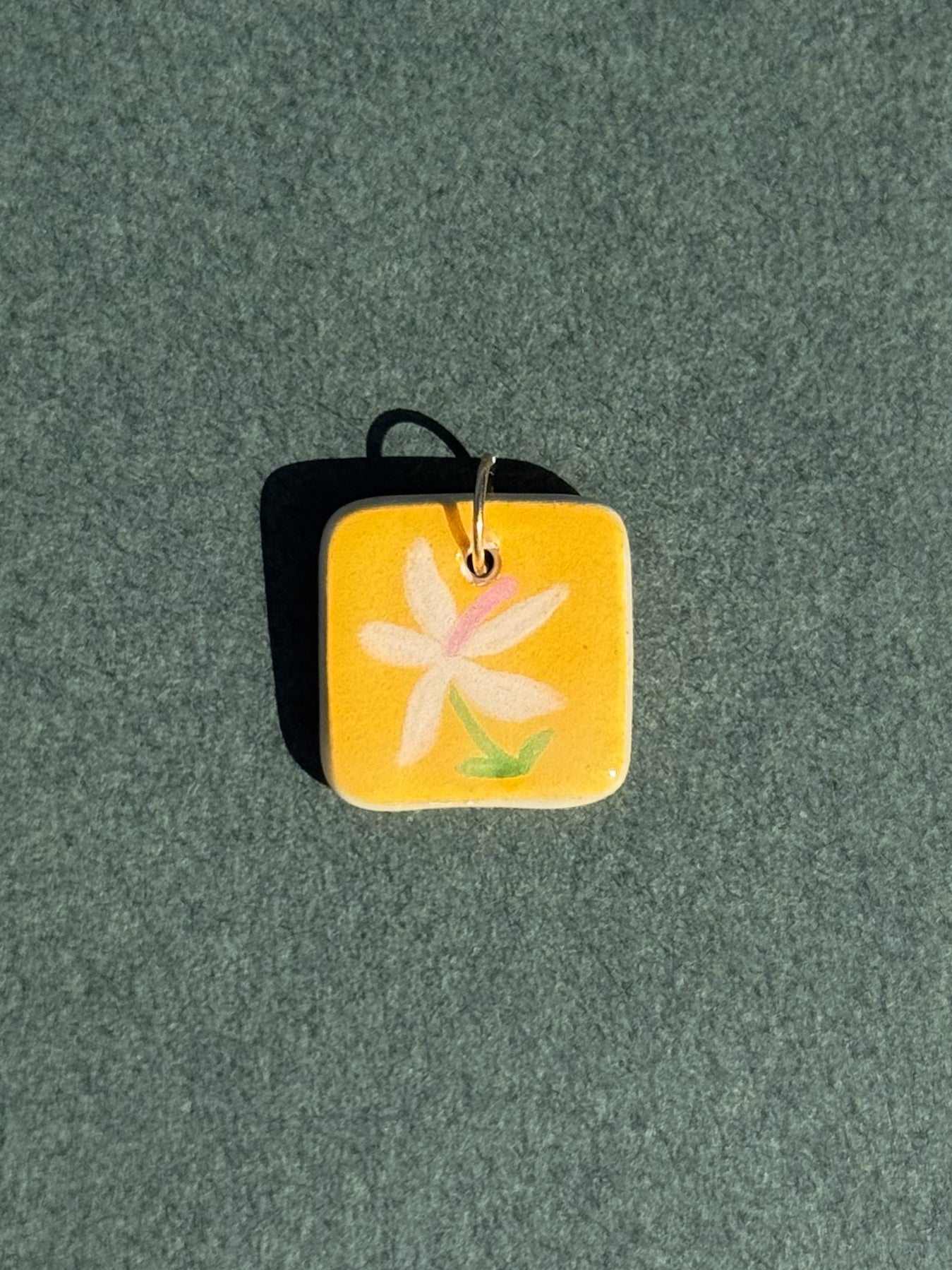 La fleur - Médaillon + Carte postale