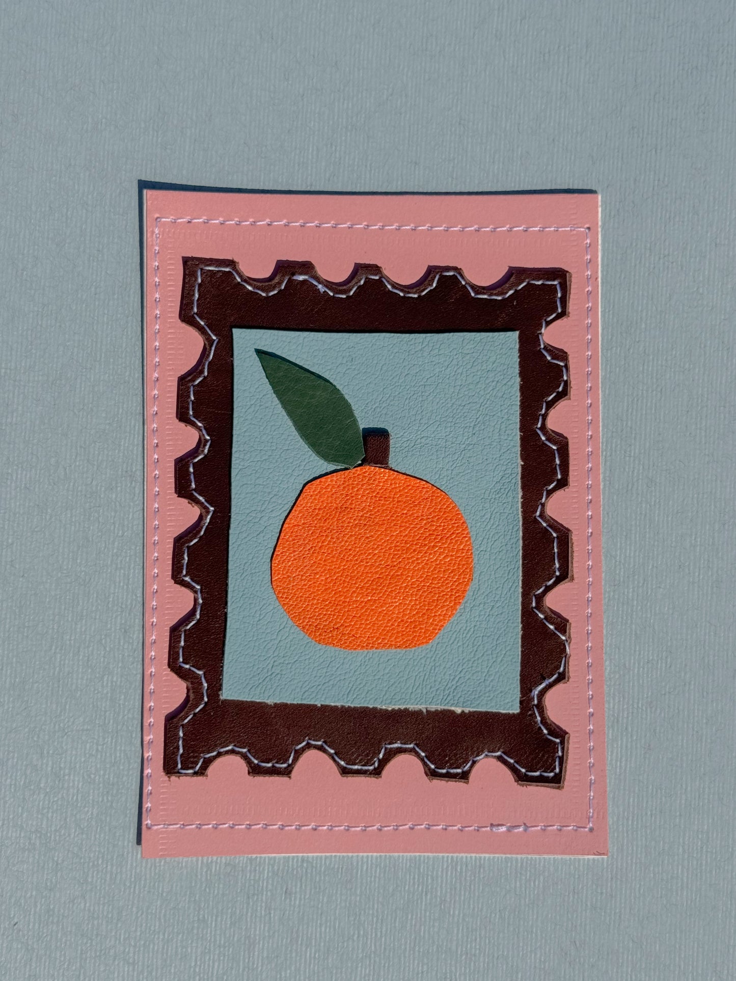 L'orange - Médaillon + Carte postale