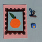L'orange - Médaillon + Carte postale