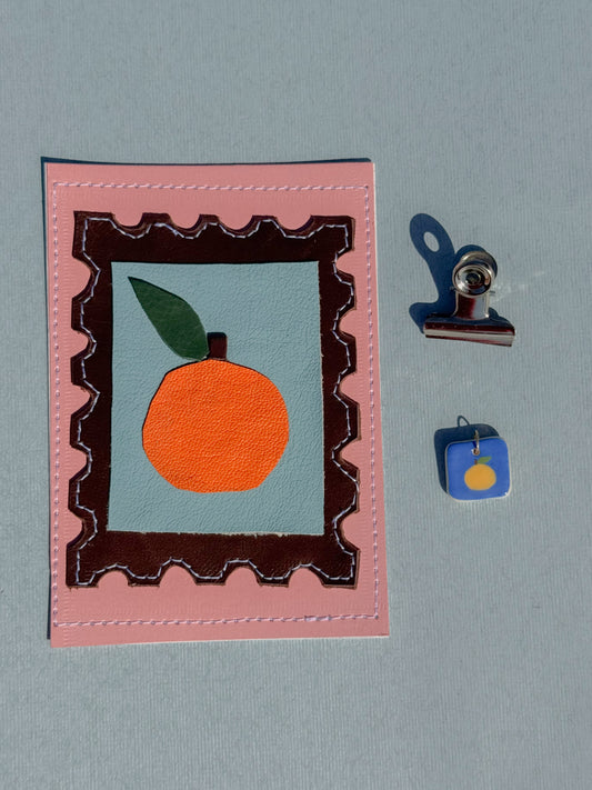 L'orange - Médaillon + Carte postale